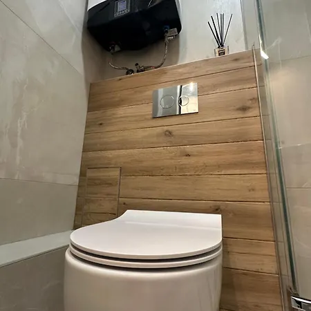 In Апартамент *